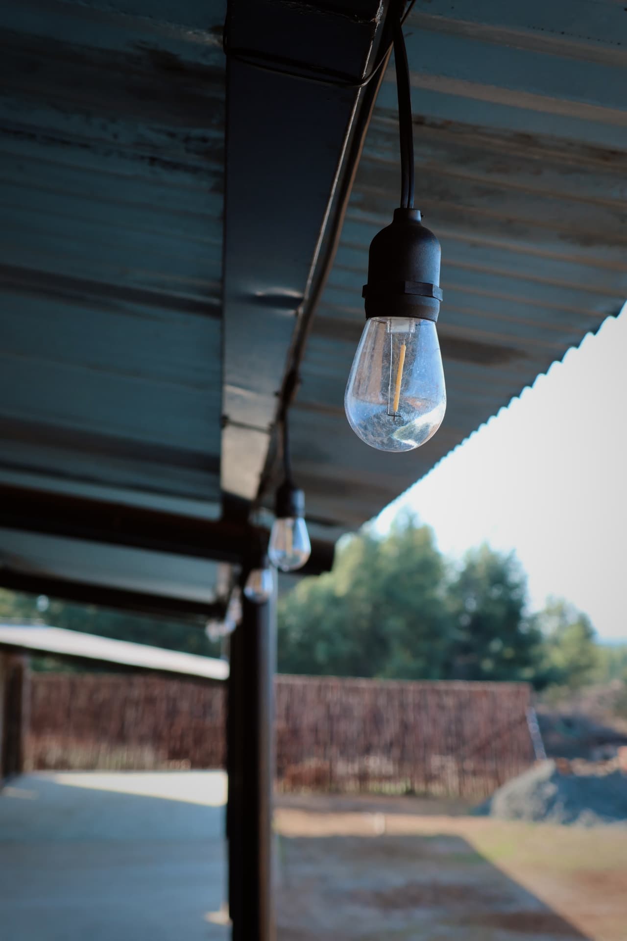 Festoon lights strung along the lodge veranda
