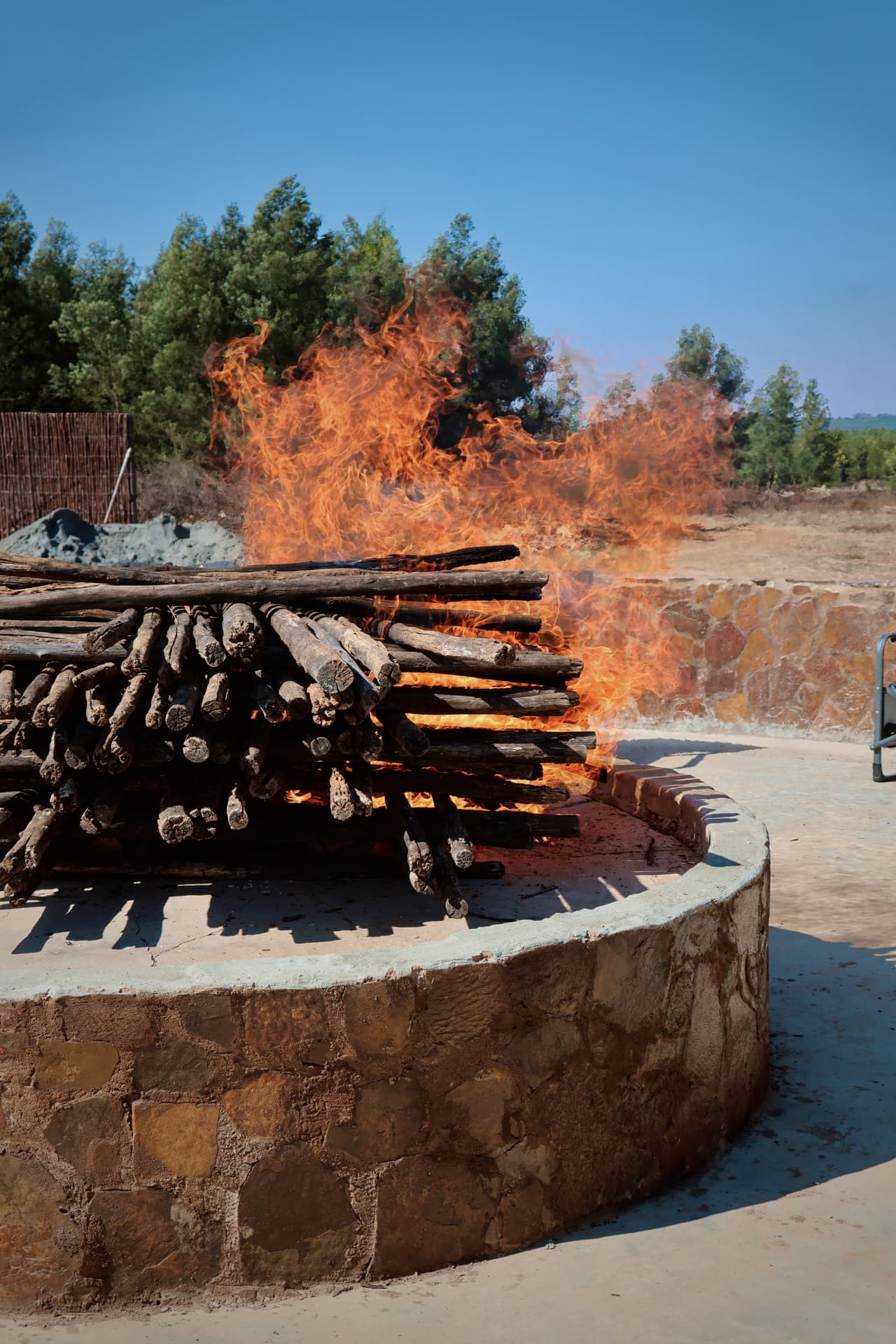 Bonfire alight in the stone fire pit