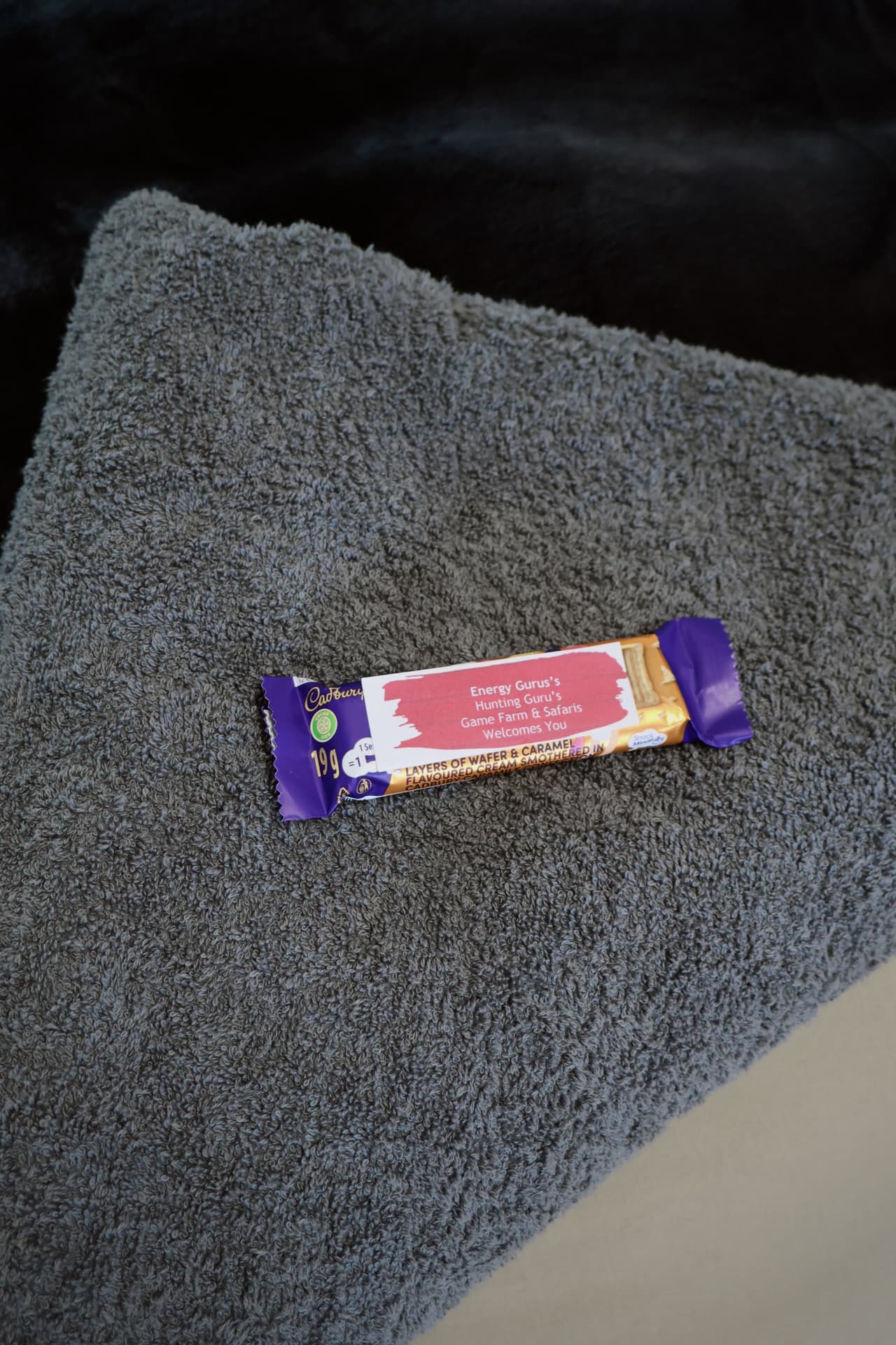 Welcome chocolate on a folded guest towel